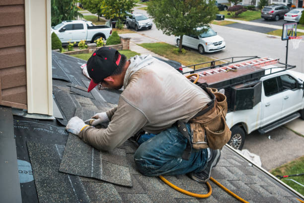 Professional Emergency Roof Repair technician working in North Liberty, IN